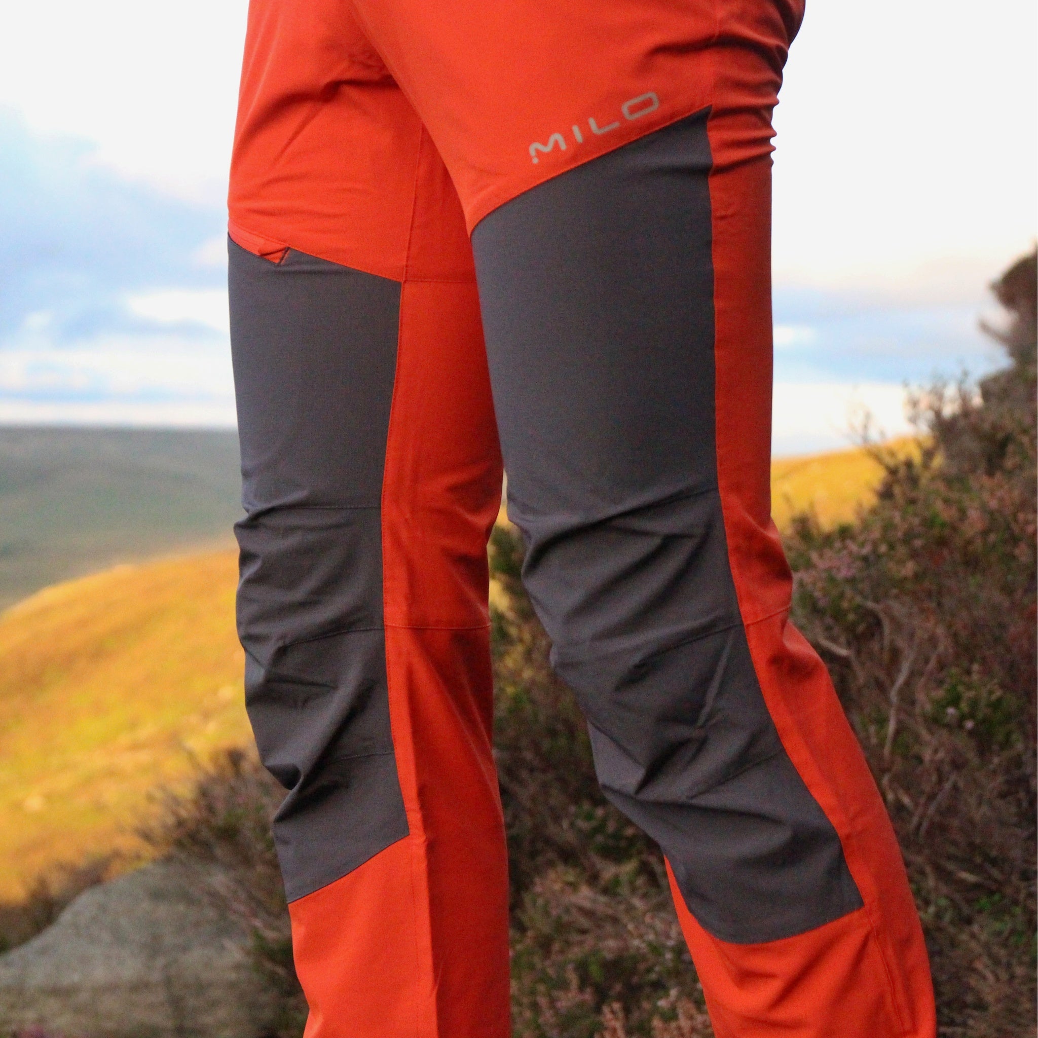 Orange store walking trousers